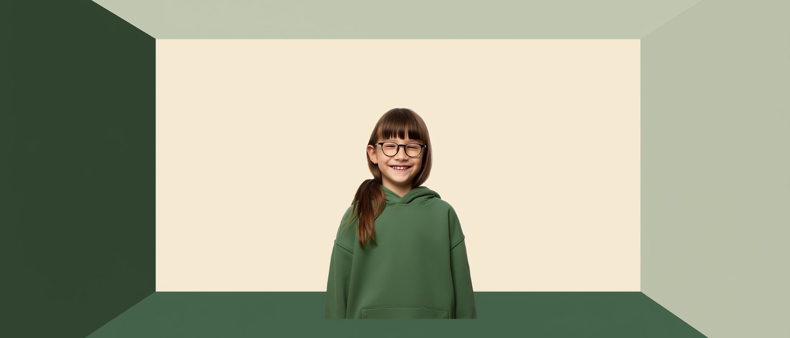 A smiling teenage girl in eyeglasses by a window